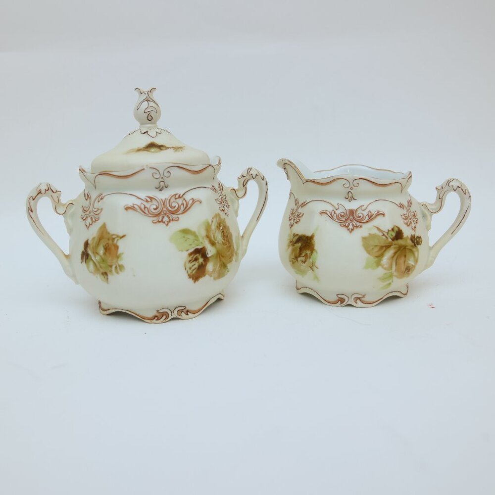 Silesia Old Ivory china creamer and covered sugar bowl.